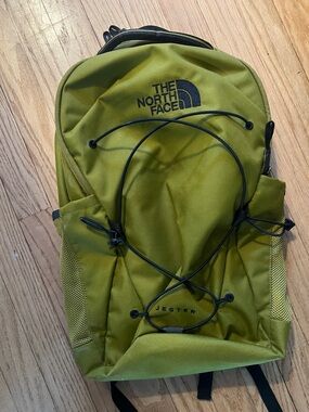 The North Face Jester Backpack in Olive Green and Black Accents